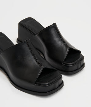 Luca mules in black leather